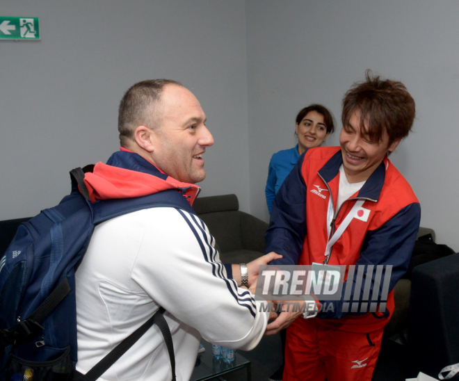 Делегации различных стран проходят аккредитацию на Кубок мира по прыжкам на батуте в Баку. Азербайджан, 3 март, 2016 